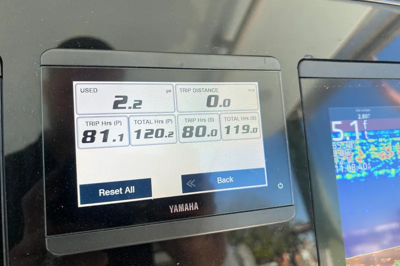 Slide: The Image of Yamaha display on 2022 World Cat 280 CC-X showing trip and fuel data. - 31
