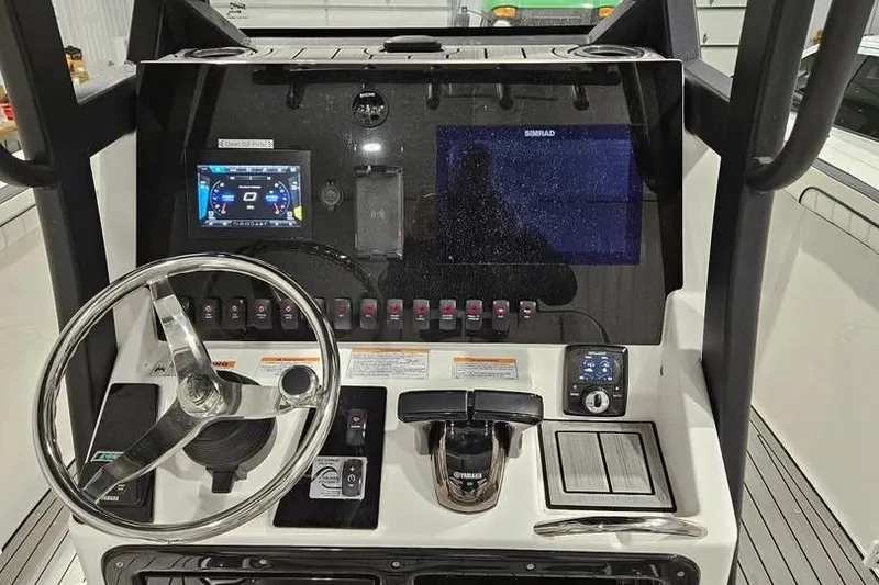 Slide: The Image of 2023 Yamaha Boats 255 FSH Sport E interior detail, showcasing sleek design and functionality. - 19