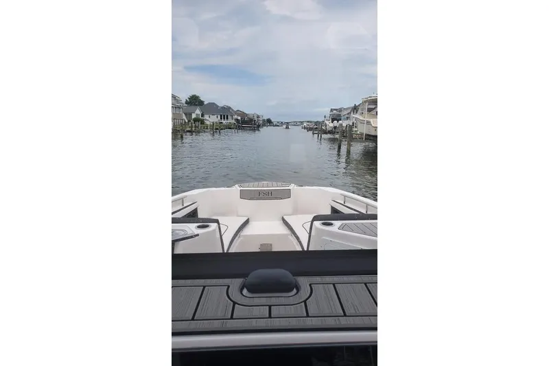 Slide: The Image of 2023 Yamaha Boats 255 FSH Sport E interior view at Rhode River Boat Sales. - 22