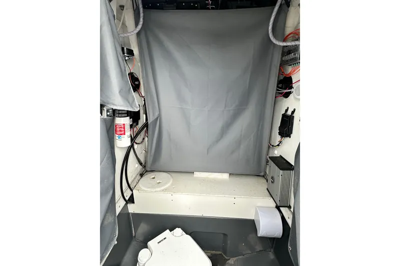 Slide: The Image of Interior view of 2023 Yamaha Boats 255 FSH Sport E, showcasing equipment and storage area. - 33