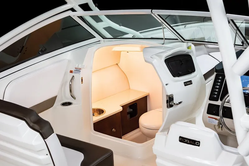 Slide: The Image of Manufacturer Provided Image: 2021 Robalo R247 Dual Console boat interior with cabin and helm. - 31