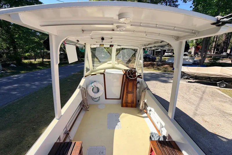 Slide: The Image of Interior view of a 2018 Custom Loon boat and hard top canopy. - 32