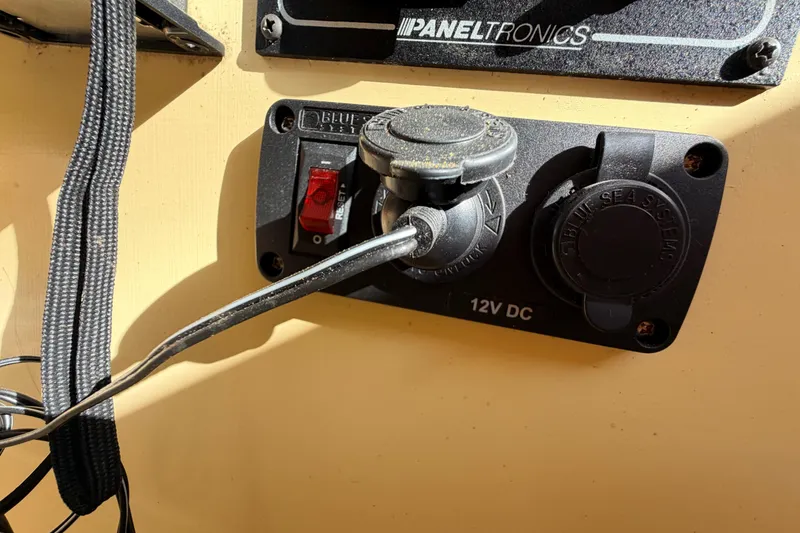 Slide: The Image of Control panel with 12V DC outlet and switch on Custom Loon 2018 model. - 45