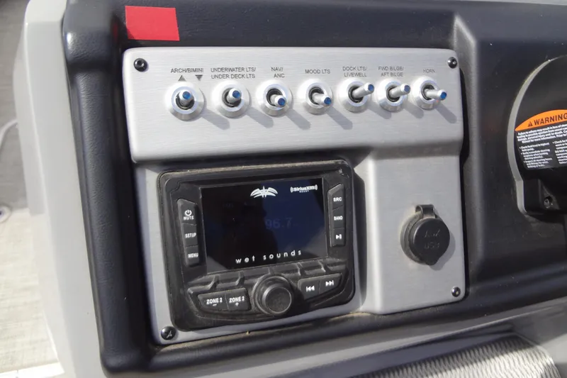 Slide: The Image of Control panel of 2022 Berkshire 25RFX STS 3.0 with switches and audio system. - 22