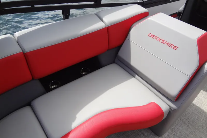 Slide: The Image of Red and gray seating on 2022 Berkshire 25RFX STS 3.0 boat. - 32