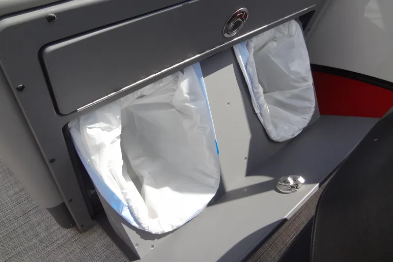Slide: The Image of 2022 Berkshire 25RFX STS 3.0 boat interior with dual trash bins. - 39