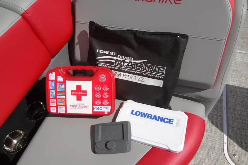 Slide: The Image of First aid kit and accessories on 2022 Berkshire 25RFX STS 3.0 boat seat. - 40