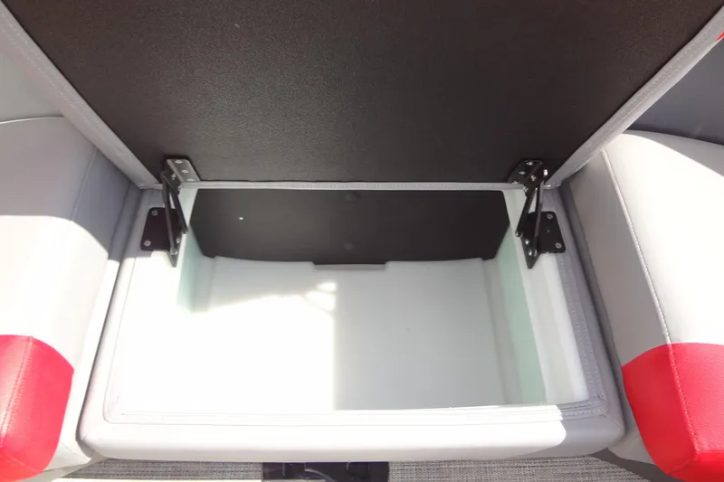 Slide: The Image of Open storage compartment in 2022 Berkshire 25RFX STS 3.0 boat seat. - 41