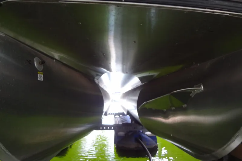 Slide: The Image of Underneath view of 2022 Berkshire 25RFX STS 3.0 pontoon boat on water. - 52