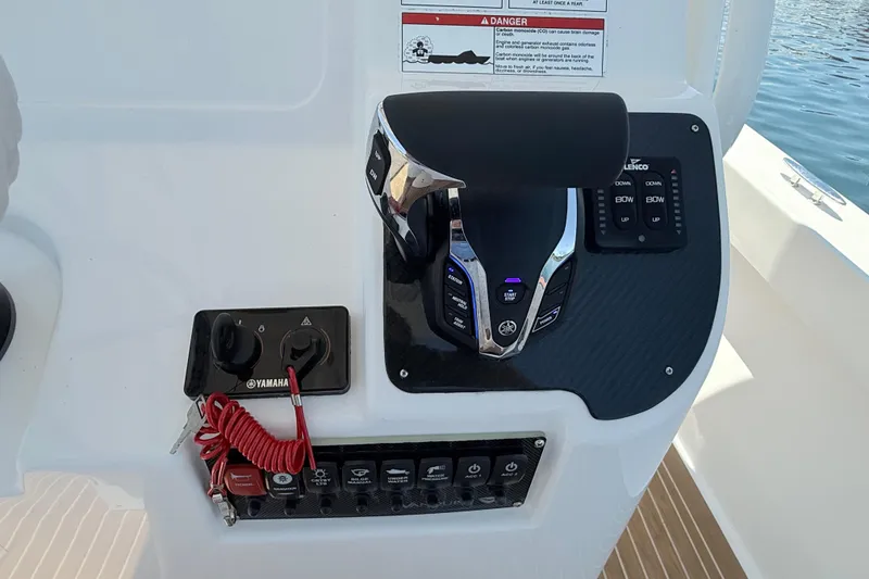 Slide: The Image of Control panel of 2017 Vanquish Bristol Harbor 23 CC boat with Yamaha throttle. - 28