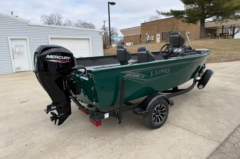 Slide: The Image of 2026 Lund 1650 Rebel XL SS boat with Mercury engine on trailer. - 6