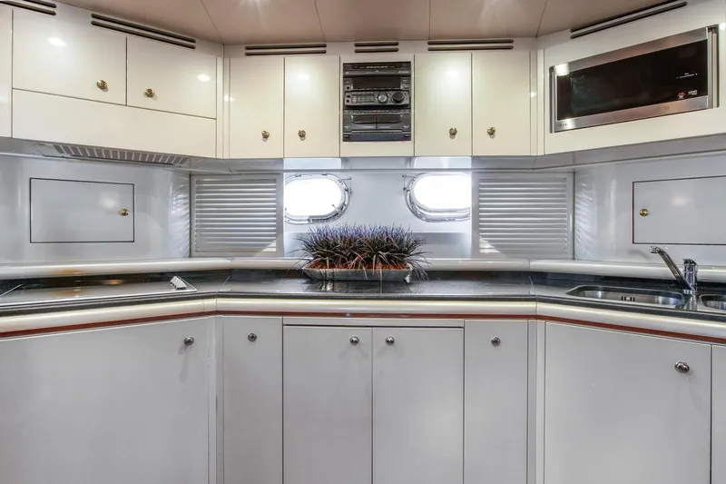 Slide: The Image of Interior of 1998 Baia Sports Cruiser with modern kitchen. - 17