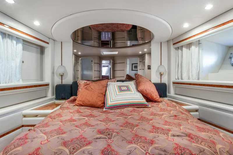 Slide: The Image of Luxurious bedroom in a 1998 Baia Sports Cruiser yacht. - 20