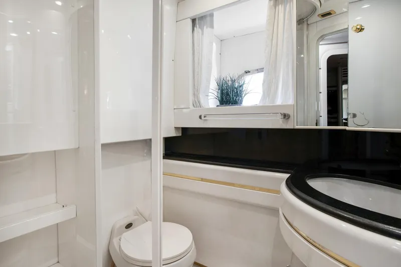 Slide: The Image of Luxurious bathroom in a 1998 Baia Sports Cruiser yacht. - 23