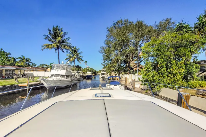 Slide: The Image of 1998 Baia Sports Cruiser on a sunny waterway. - 6