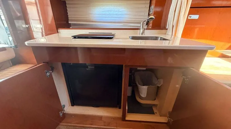 Slide: The Image of Interior of 2010 Sea Ray Sundancer 310 yacht kitchen. - 25