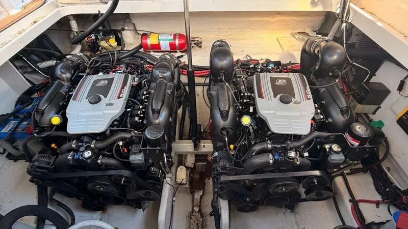 Slide: The Image of Twin engines in a 2010 Sea Ray Sundancer 310. - 28