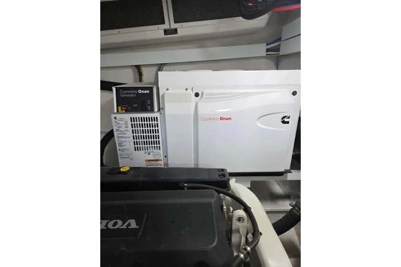 Slide: The Image of Cummins Onan generator in 2018 Cruisers Yachts 54 Cantius engine room. - 10