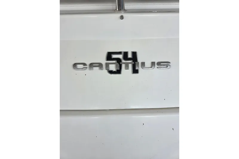 Slide: The Image of 2018 Cruisers Yachts 54 Cantius logo on white surface. - 7