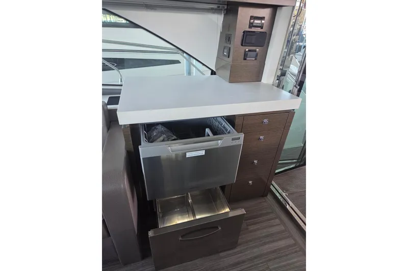 Slide: The Image of 2018 Cruisers Yachts 54 Cantius interior with modern kitchen cabinetry and appliances. - 8