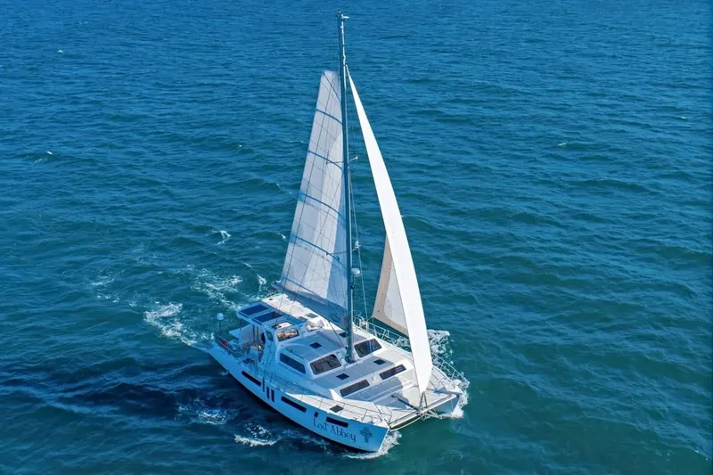 Slide: The Image of 2021 Royal Cape Catamarans Majestic sailing on open blue sea. - 11