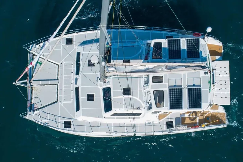 Slide: The Image of Aerial view of 2021 Royal Cape Catamarans Majestic with solar panels on deck. - 2