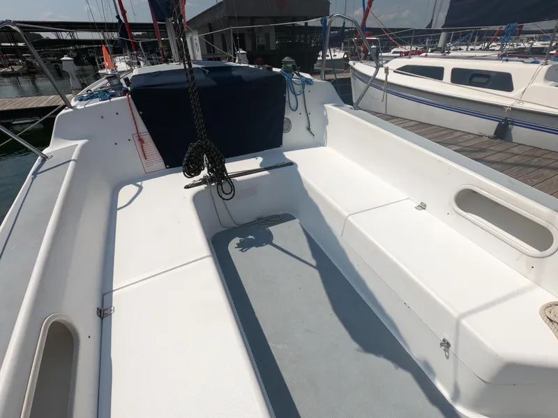 Slide: The Image of Interior of a 1998 Catalina 250 yacht at the marina. - 13