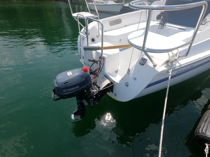 Slide: The Image of Rear view of a Catalina 250 yacht with Yamaha outboard motor. - 15