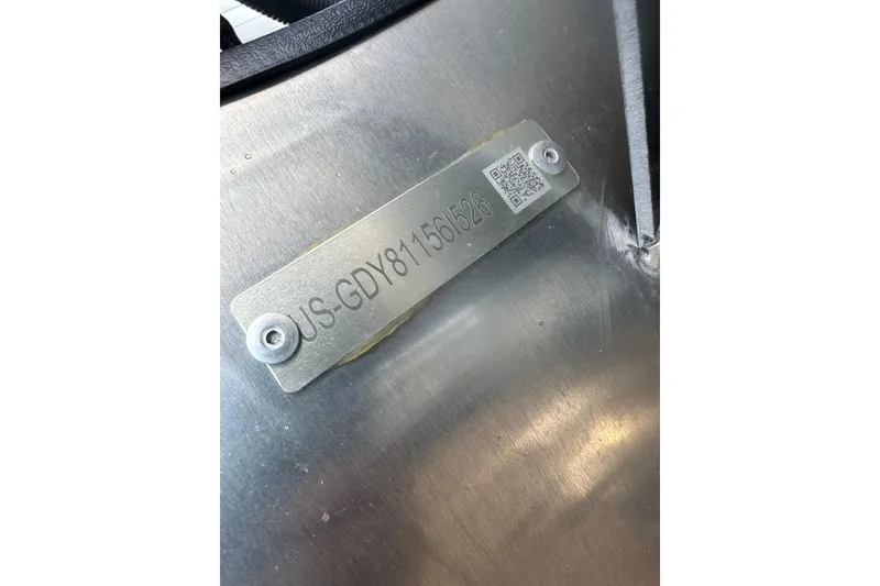 Slide: The Image of 2026 Godfrey Monaco Sun Deck 235 SDC boat, sleek design with black and white detailing. - 12