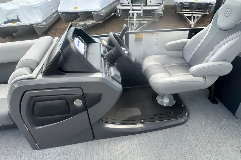 Slide: The Image of Luxurious seating on 2026 Godfrey Monaco Sun Deck 235 SDC boat with cup holder. - 15