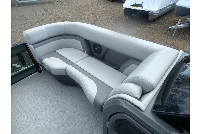 Slide: The Image of 2026 Godfrey Monaco Sun Deck 235 SDC interior with seating and storage area. - 25