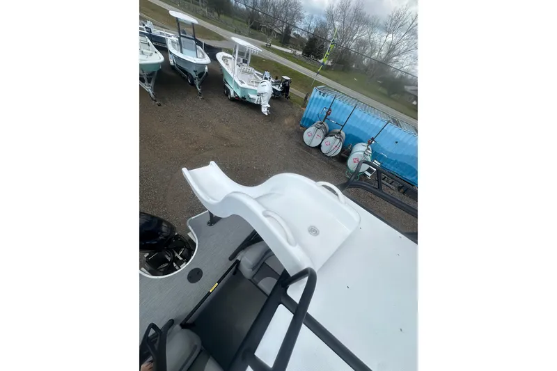 Slide: The Image of 2026 Godfrey Monaco Sun Deck 235 SDC interior with open storage compartment. - 30