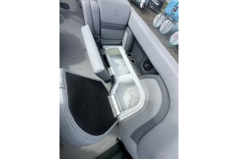 Slide: The Image of Luxurious seating on 2026 Godfrey Monaco Sun Deck 235 SDC boat, featuring cup holder. - 33