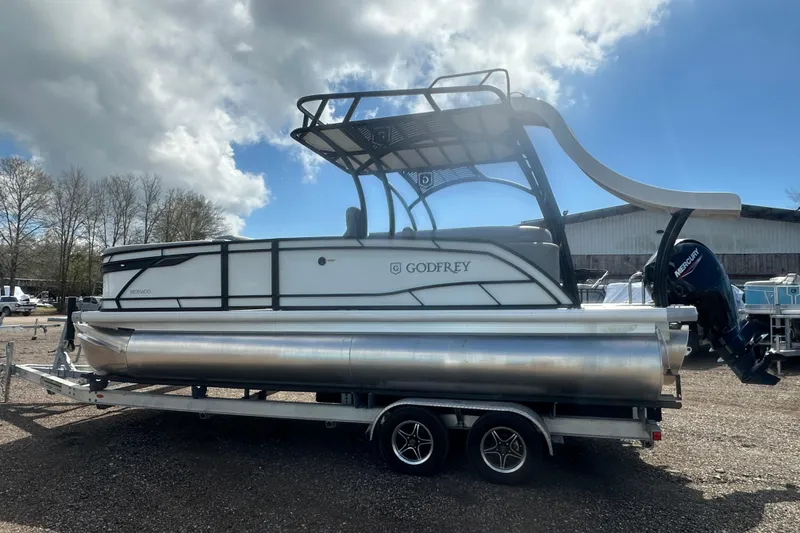 Slide: The Image of 2026 Godfrey Monaco Sun Deck 235 SDC pontoon boat with Mercury outboard motor. - 6