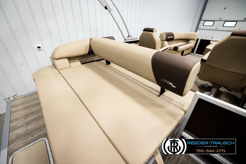 Slide: The Image of 2026 Bennington SSBSF boat interior with beige seating and modern design. - 23