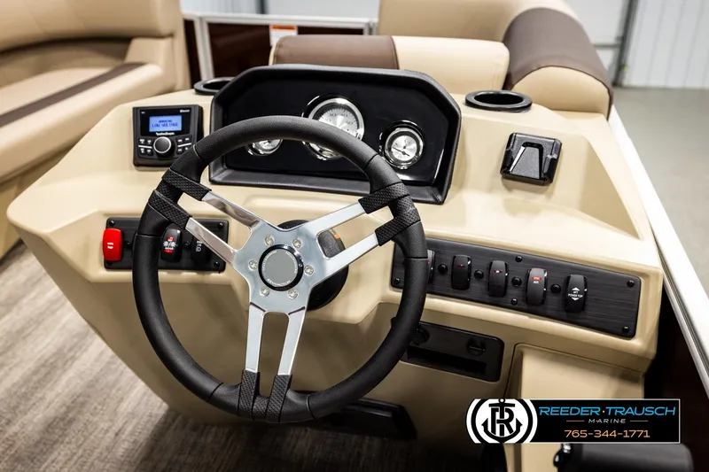 Slide: The Image of 2026 Bennington SSBSF boat dashboard with steering wheel and control panel. - 26