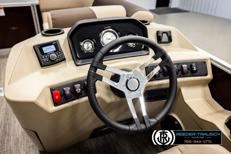 Slide: The Image of 2026 Bennington SSBSF boat dashboard with steering wheel and control panel. - 27