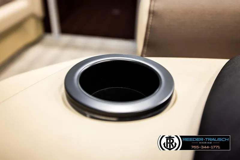 Slide: The Image of Cup holder on 2026 Bennington SSBSF boat, featuring beige upholstery. - 31