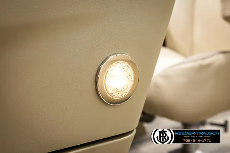 Slide: The Image of 2026 Bennington SSBSF interior light detail with Reeder-Trausch Marine logo. - 44
