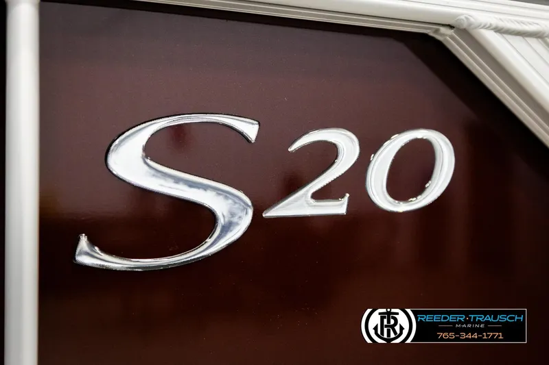 Slide: The Image of 2026 Bennington SSBSF boat with "S20" emblem, Reeder-Trausch Marine branding. - 47
