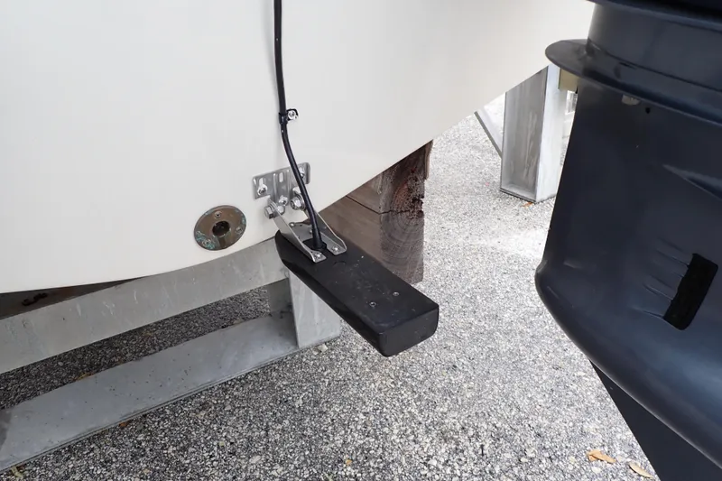 Slide: The Image of 2016 Grady-White Freedom 275 boat transom with mounted sensor and outboard motor. - 101