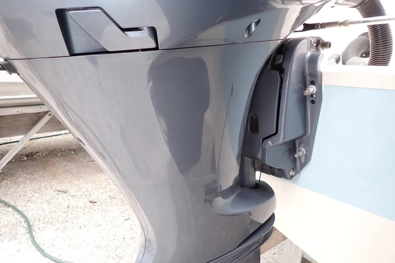 Slide: The Image of Close-up of a 2016 Grady-White Freedom 275 boat engine detail. - 103