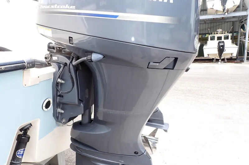 Slide: The Image of 2016 Grady-White Freedom 275 boat with Yamaha four-stroke outboard motor. - 106
