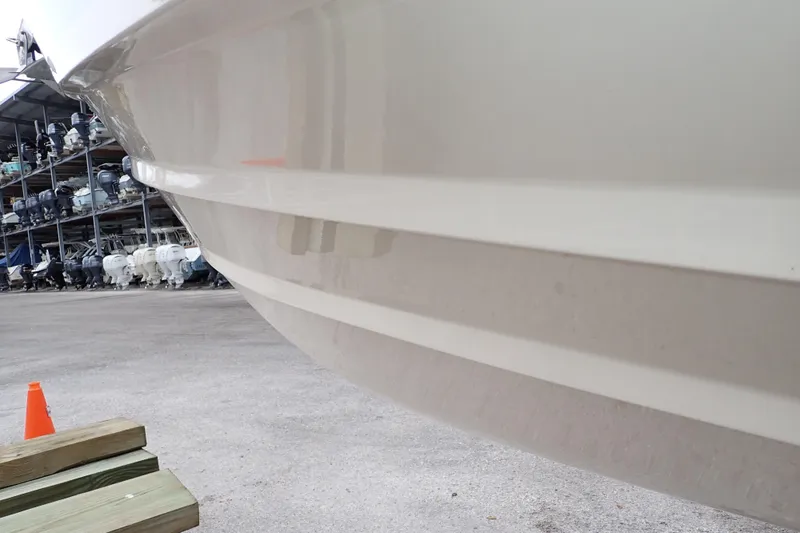 Slide: The Image of 2016 Grady-White Freedom 275 boat hull in storage facility. - 123