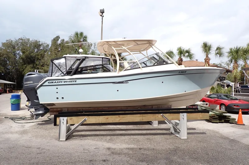 Slide: The Image of 2016 Grady-White Freedom 275 boat on display with Yamaha engine. - 132