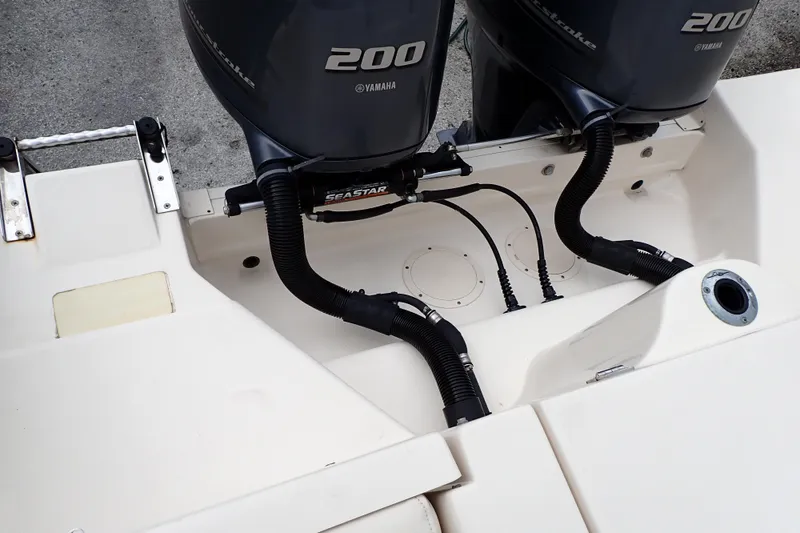 Slide: The Image of 2016 Grady-White Freedom 275 boat with dual Yamaha 200 engines. - 17