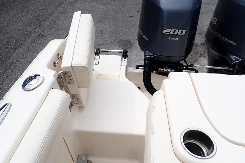 Slide: The Image of 2016 Grady-White Freedom 275 boat interior with Yamaha 200 engines. - 33