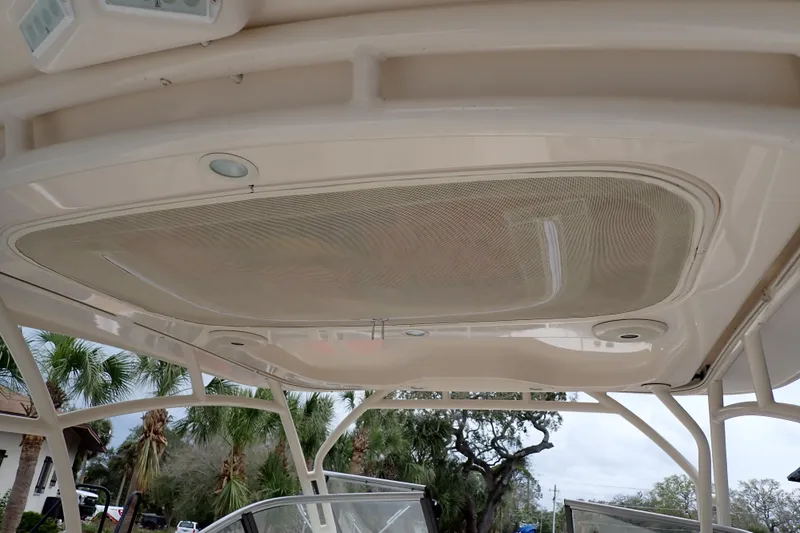 Slide: The Image of 2016 Grady-White Freedom 275 boat interior roof with integrated lighting and speakers. - 40