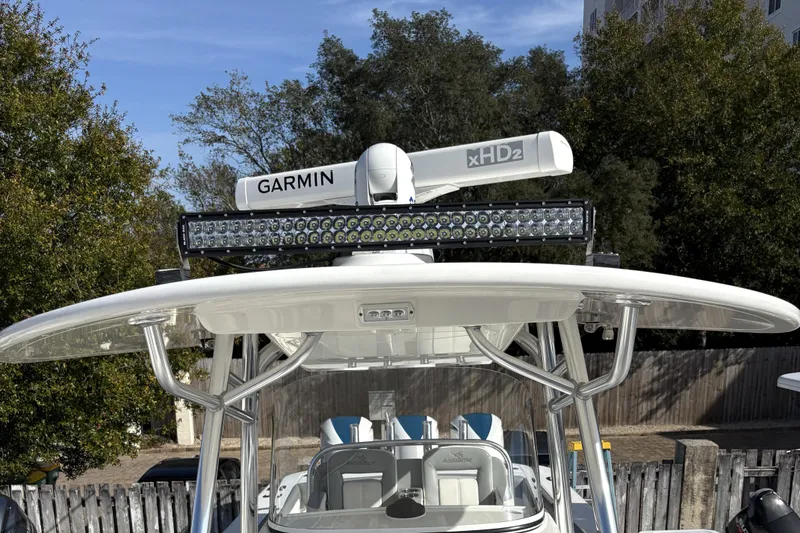 Slide: The Image of 2018 Regulator 34 Center Console with Garmin radar and LED light bar on T-top. - 12