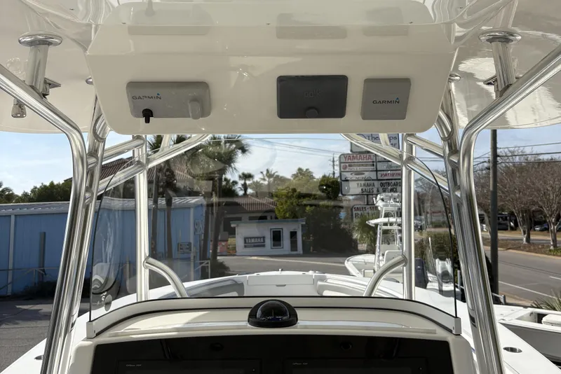 Slide: The Image of 2018 Regulator 34 Center Console boat dashboard with Garmin electronics and street view. - 24